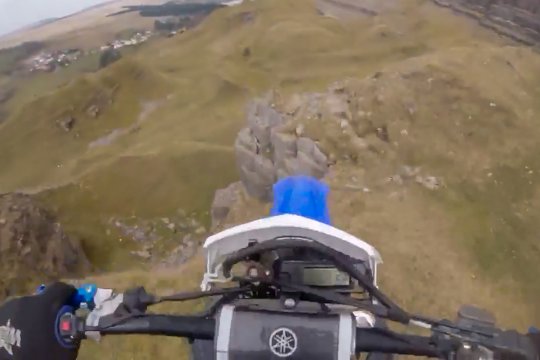 Adrian Owen rides off cliff